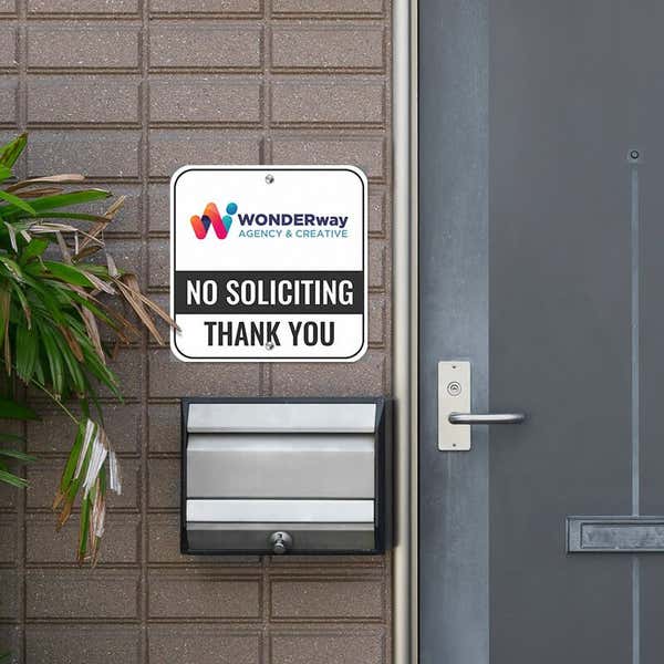 No soliciting sign with Wonderway agency & creative logo reading Thank you hung next to front door