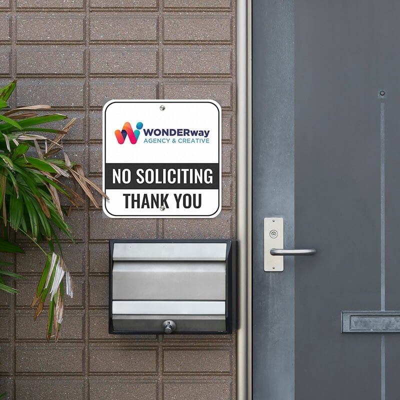 No soliciting sign with Wonderway agency & creative logo reading Thank you hung next to front door