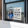 Clap, Honk, Wave Graduation Yard Sign in a Window