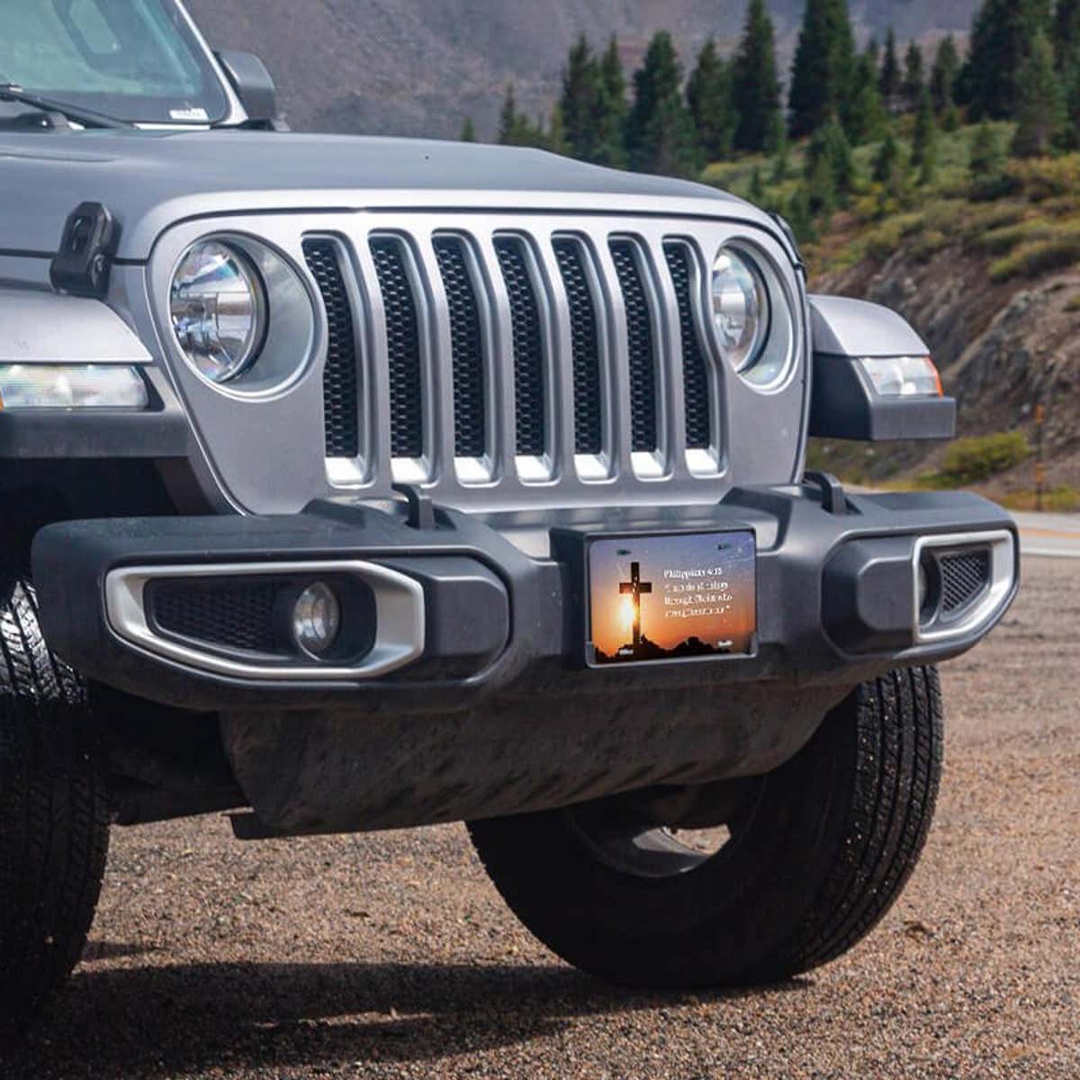 All Things Through Christ front license plate on a Jeep