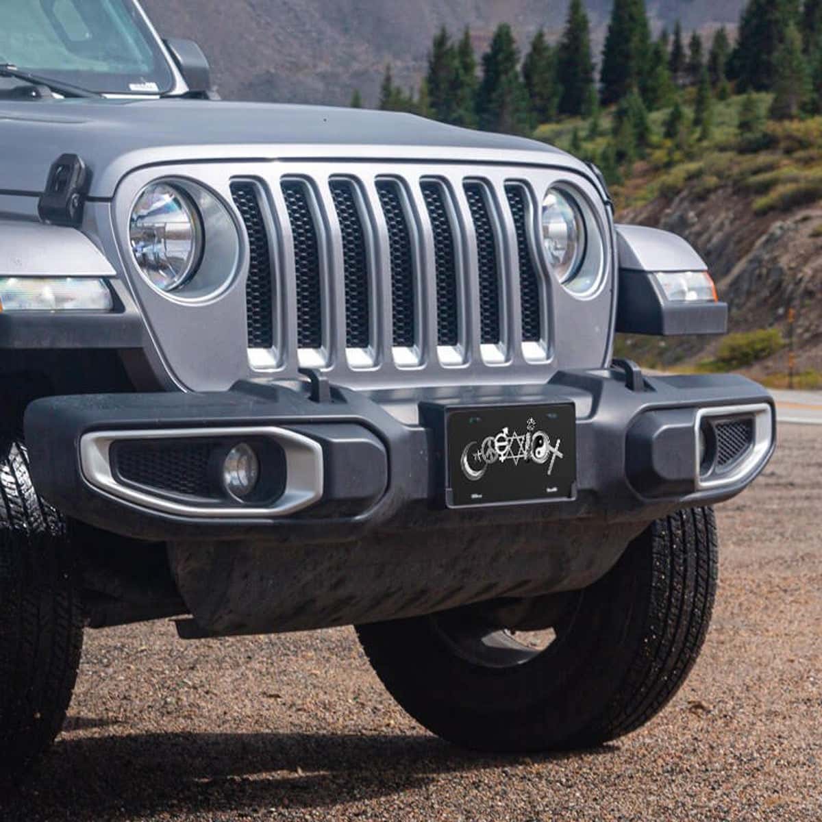 Coexist front license plate on a Jeep