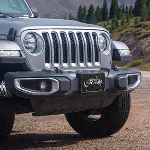 Coexist front license plate on a Jeep