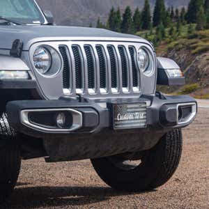 Custom American Flag front license plate on a Jeep
