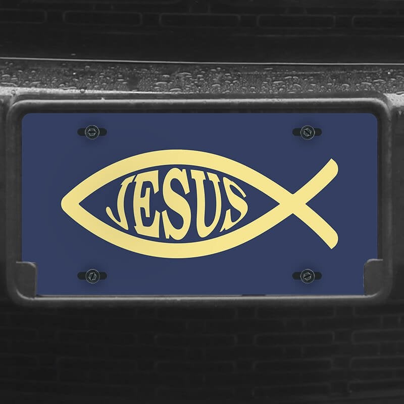 A close up of the Jesus Fish Ichthys front license plate on a black car