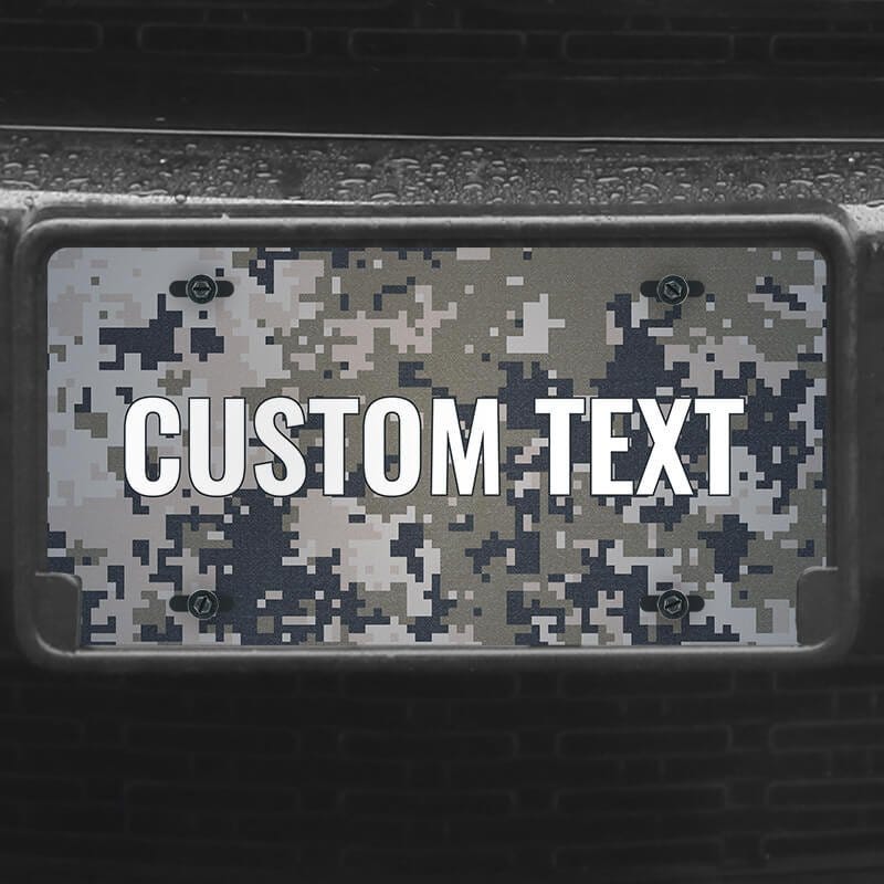 A close up of the Custom Military Camo front license plate on a black car