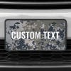 A close up of the Custom Military Camo front license plate on a white car