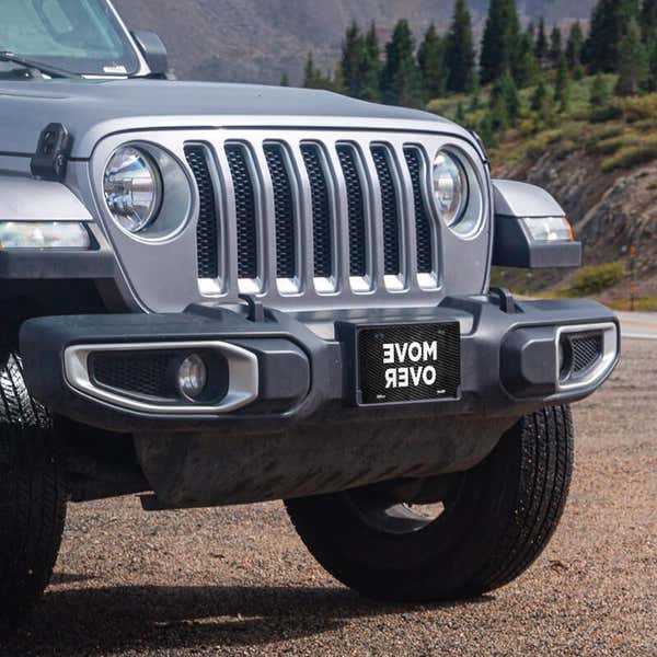 Move Over front license plate on a Jeep