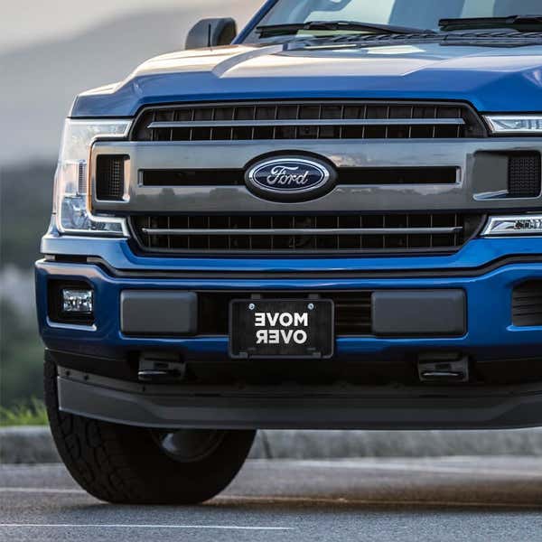Move Over front license plate on a blue truck