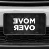 A close up of the Move Over front license plate on a white car