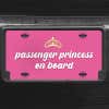 A close up of the Passenger Princess front license plate on a black car