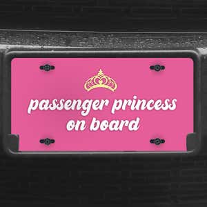 A close up of the Passenger Princess front license plate on a black car