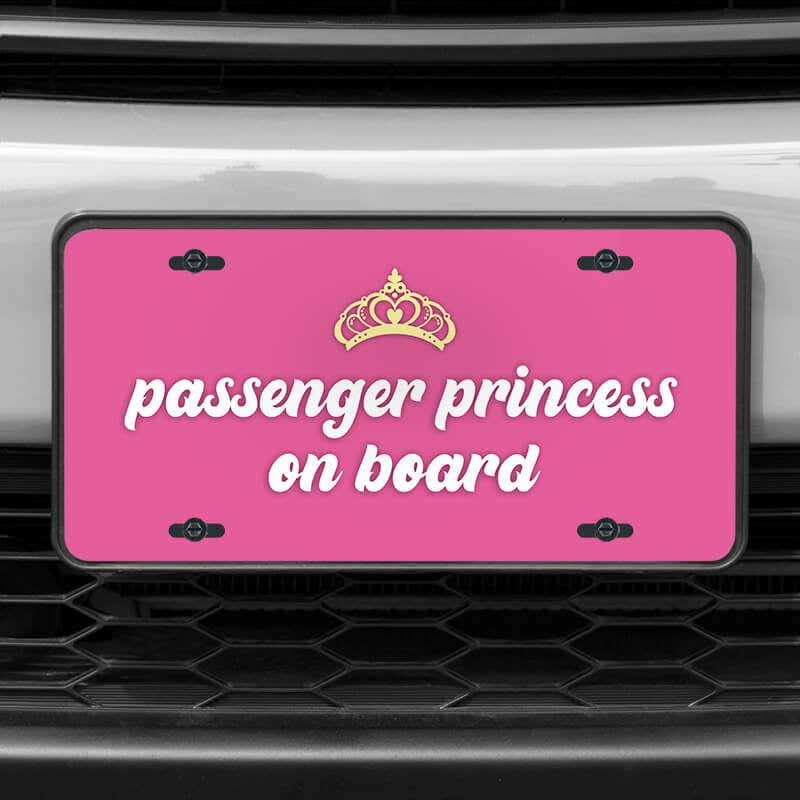 A close up of the Passenger Princess front license plate on a white car