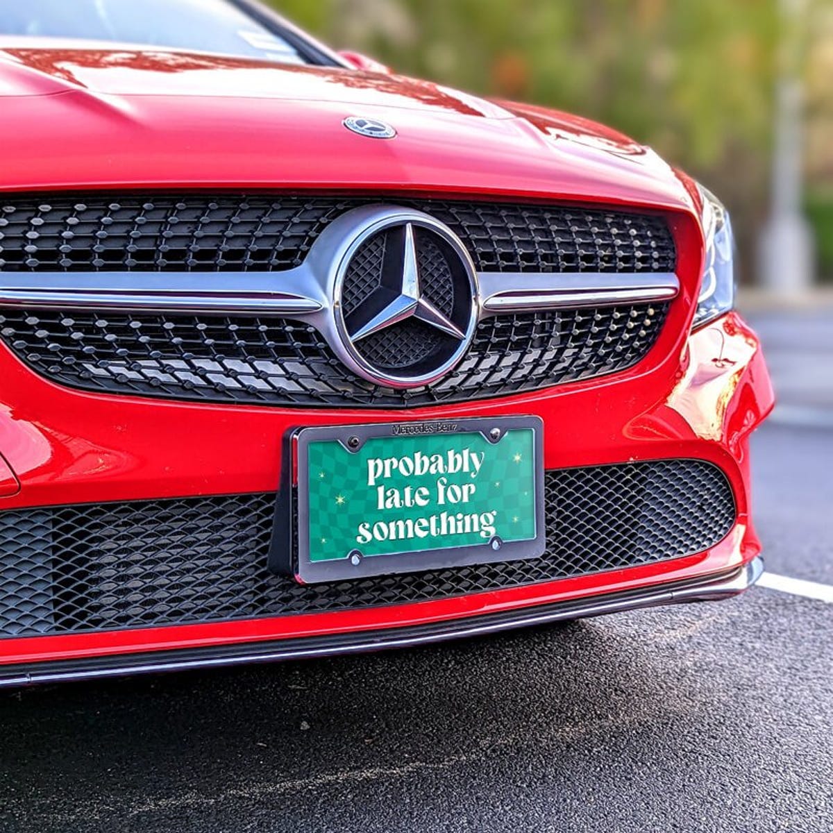 Probably Late front license plate on a red car