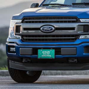 Probably Late front license plate on a blue truck