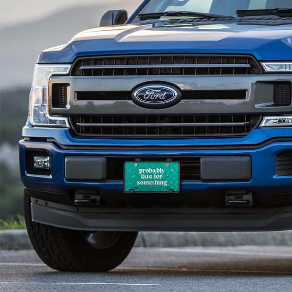 Probably Late front license plate on a blue truck