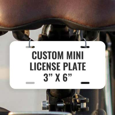 Custom Mini License Plate for Bicycle & Toy Cars 3x6 Shown on a Bicycle