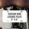 Custom Mini License Plate for Bicycle & Toy Cars 3x6 Shown on a Bicycle