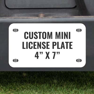 Custom Mini License Plate for Golf Carts 4x7 Shown on a Gold Cart