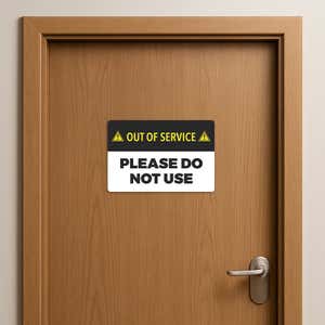 Out of Service Sign on a wooden door