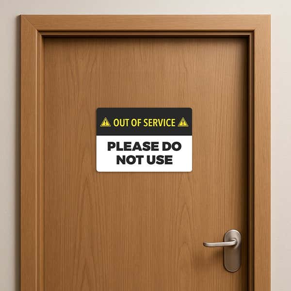 Out of Service Sign on a wooden door