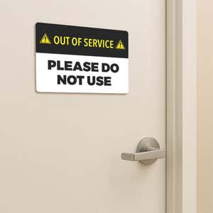 Out of Service Sign of a bathroom door