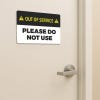 Out of Service Sign of a bathroom door
