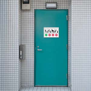 Proper Men’s Bathroom Use Funny Sign on a blue bathroom door