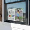 Future is bright graduation yard sign displayed in a window
