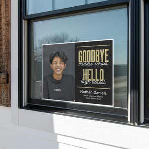 Goodbye middle school graduation yard sign displayed in a window