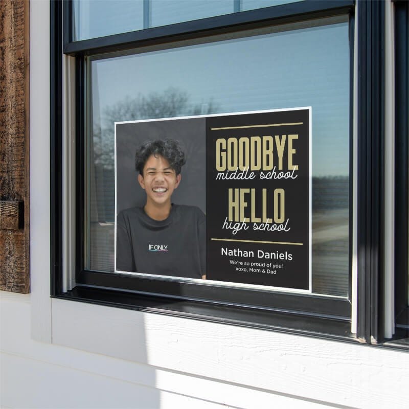 Goodbye middle school graduation yard sign displayed in a window