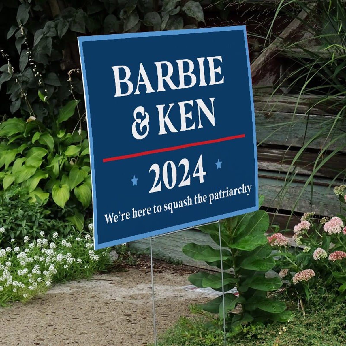 Barbie and Ken Funny Political Yard Sign Next to Stairs
