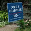 Custom Political Opinion Yard Sign Next to Stairs