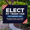 Elect My Trash Can Funny Yard Sign Next to Pavement