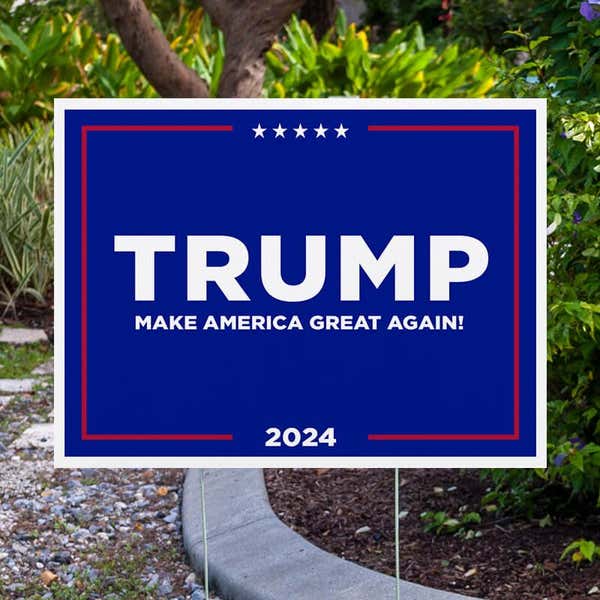 Trump MAGA Yard Sign Next to Pavement