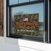 Camo MAGA Trump Yard Sign in a Window