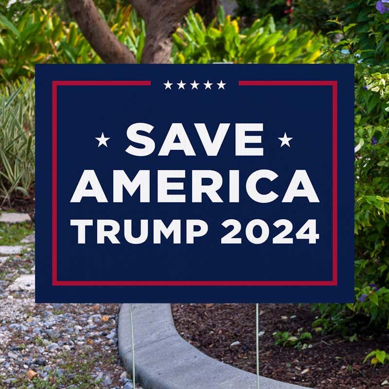 Save America Trump Yard Sign Next to Pavement