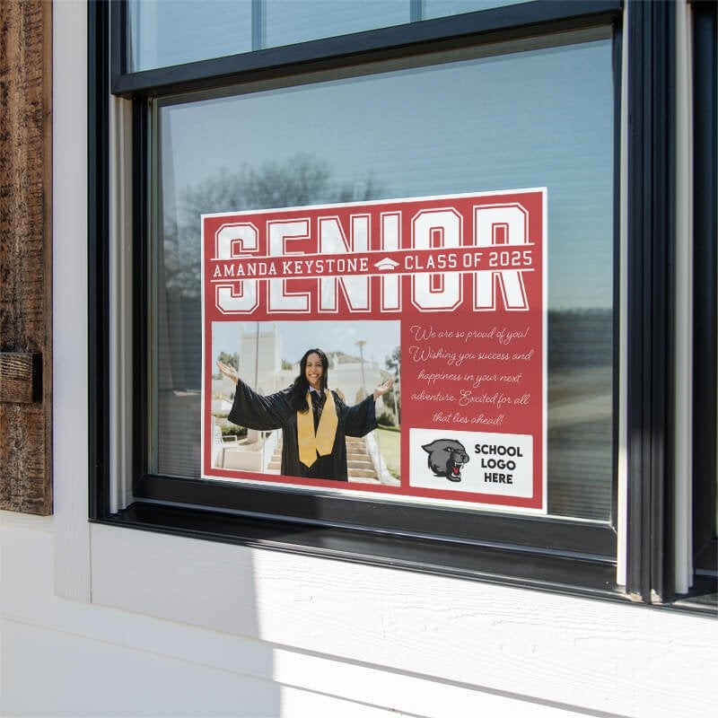 Senior Graduation Yard Sign with Note displayed in a window