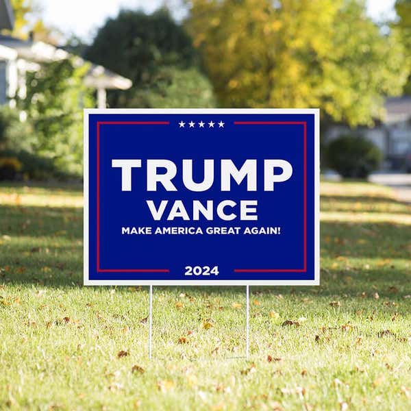 Trump Vance Blue Yard Sign in a sunny yard