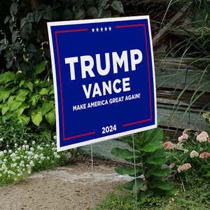 Trump Vance Blue Yard Sign next to stairs
