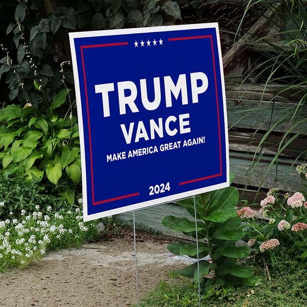 Trump Vance Blue Yard Sign next to stairs