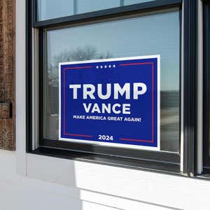 Trump Vance Blue Yard Sign in a windoe