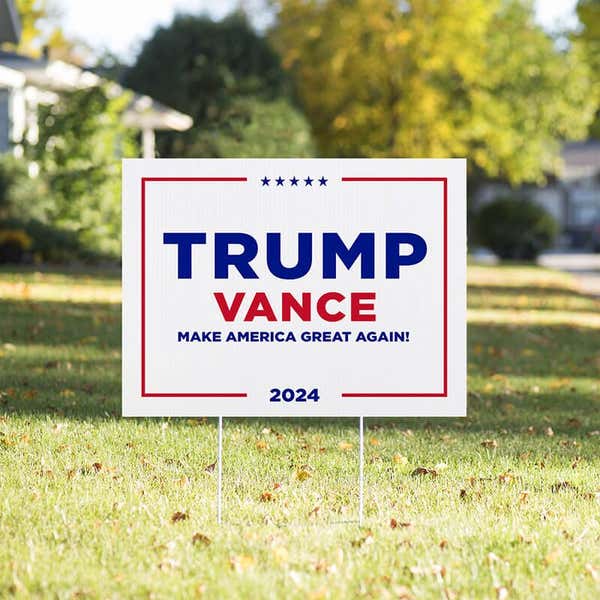 Trump Vance White Yard Sign in a sunny yard
