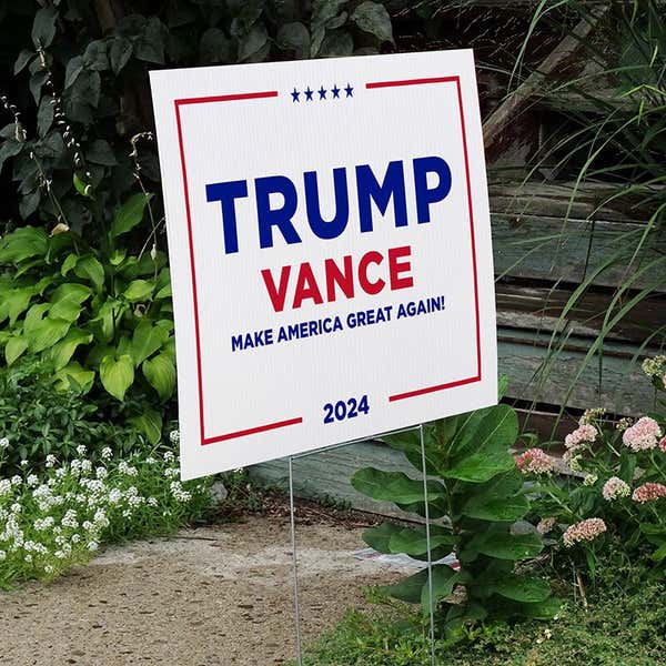 Trump Vance White Yard Sign next to stairs