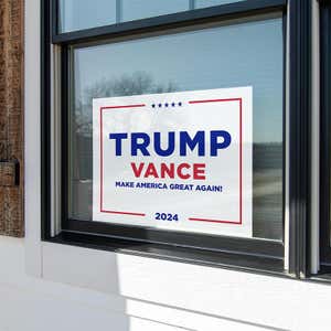 Trump Vance White Yard Sign in a window