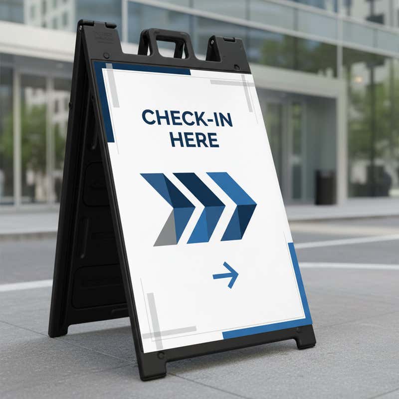 Black sandwich board A-frame sign displaying a custom check-in message outside a business
