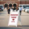 A sandwich board sign to direct graduation parking