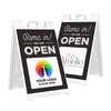 Two examples of the We Are Open sandwich board sign with an uploaded logo