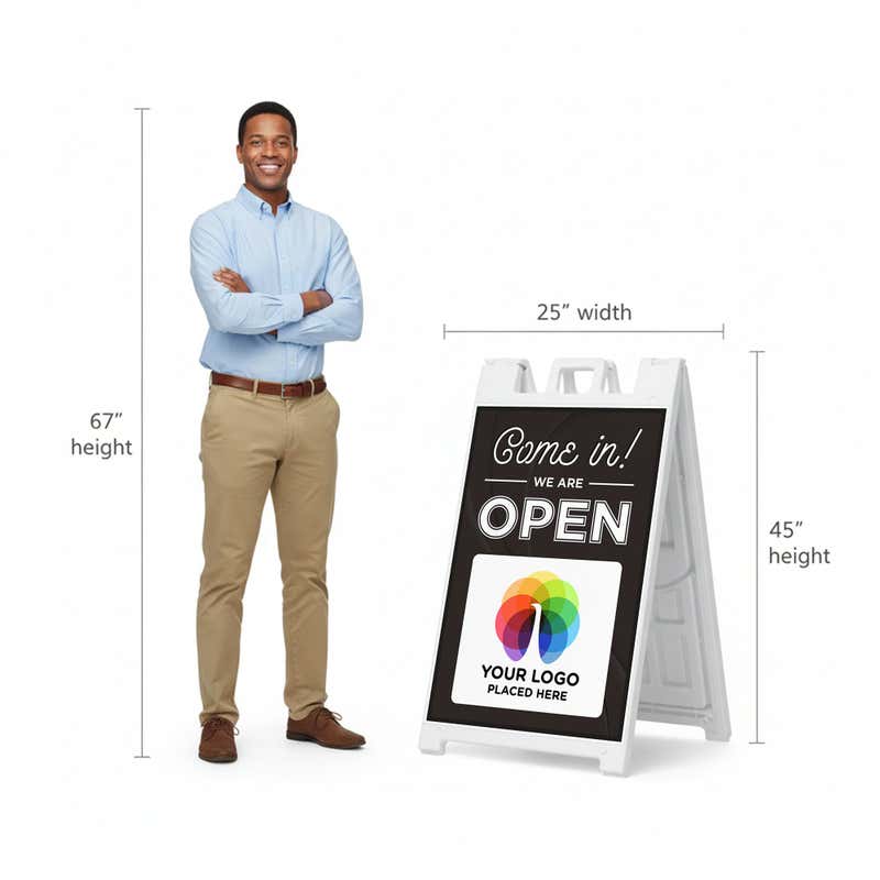 A 67-inch tall man standing next to the 45-inch tall A-frame to show the height comparison