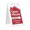 An open house sandwich board sign hosted by a realty company 