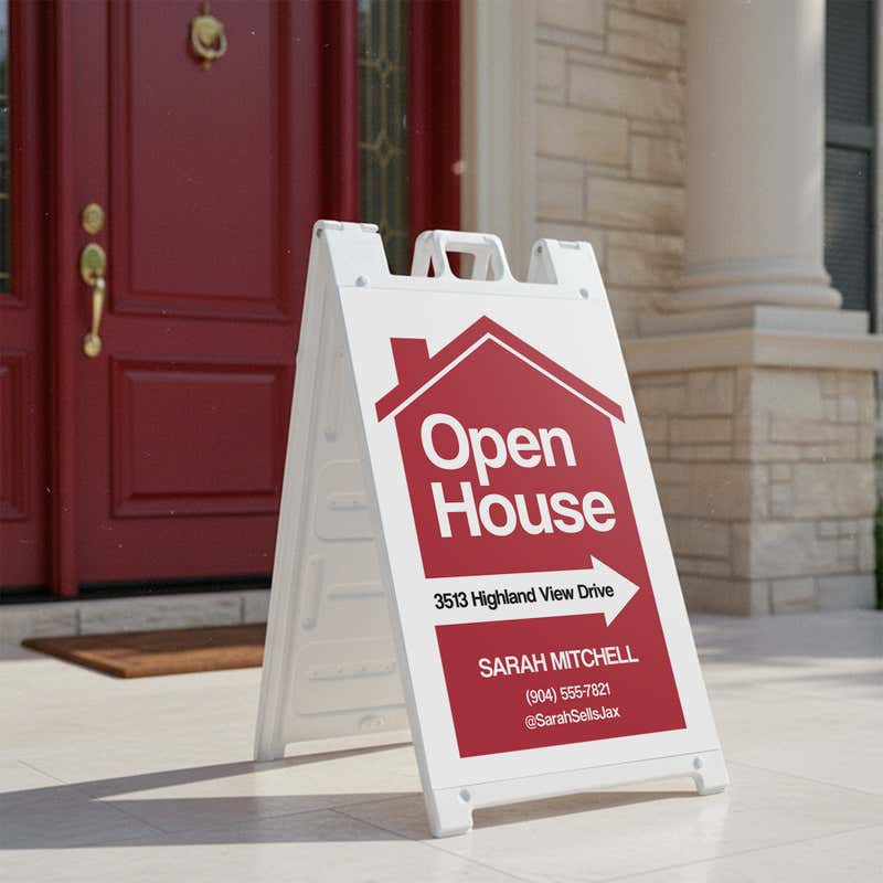 An open house sandwich board sign with custom information displayed outside of a house